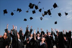 throwing graduate caps into the air